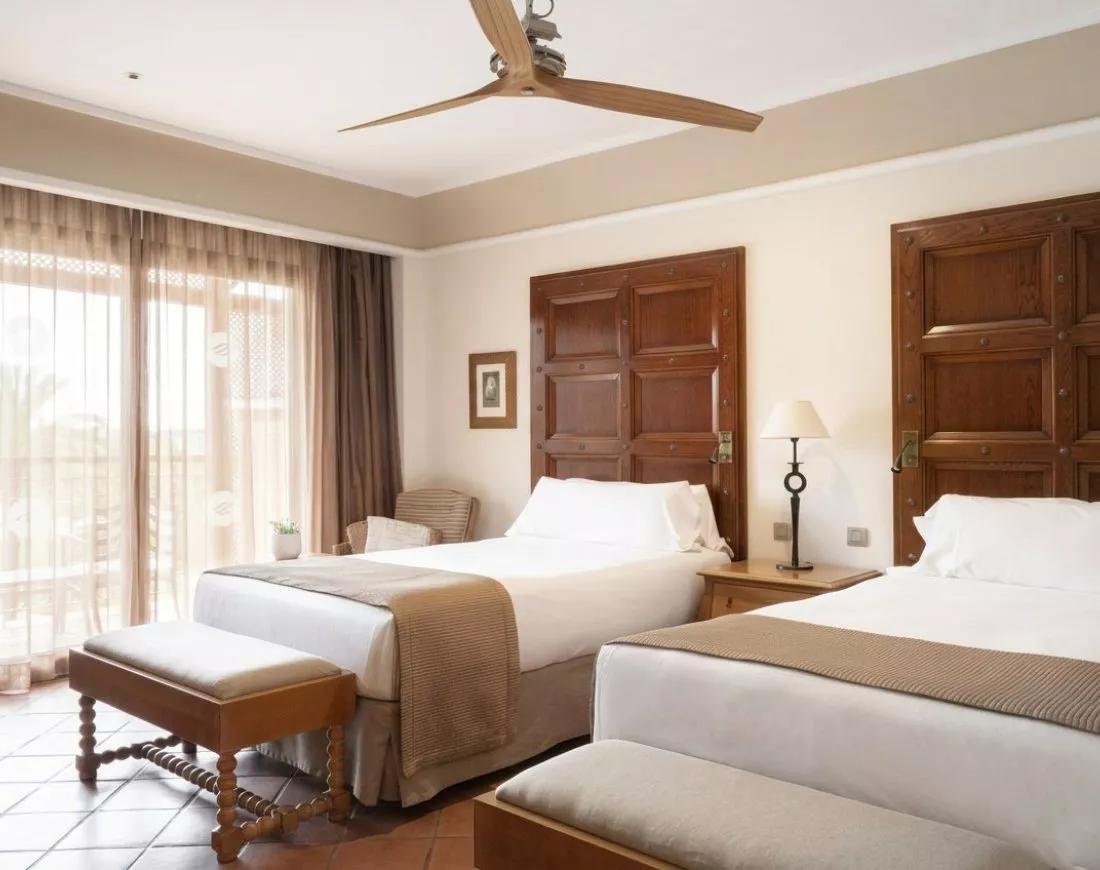 Junior Suite with private terrace overlooking the resort gardens and golf course